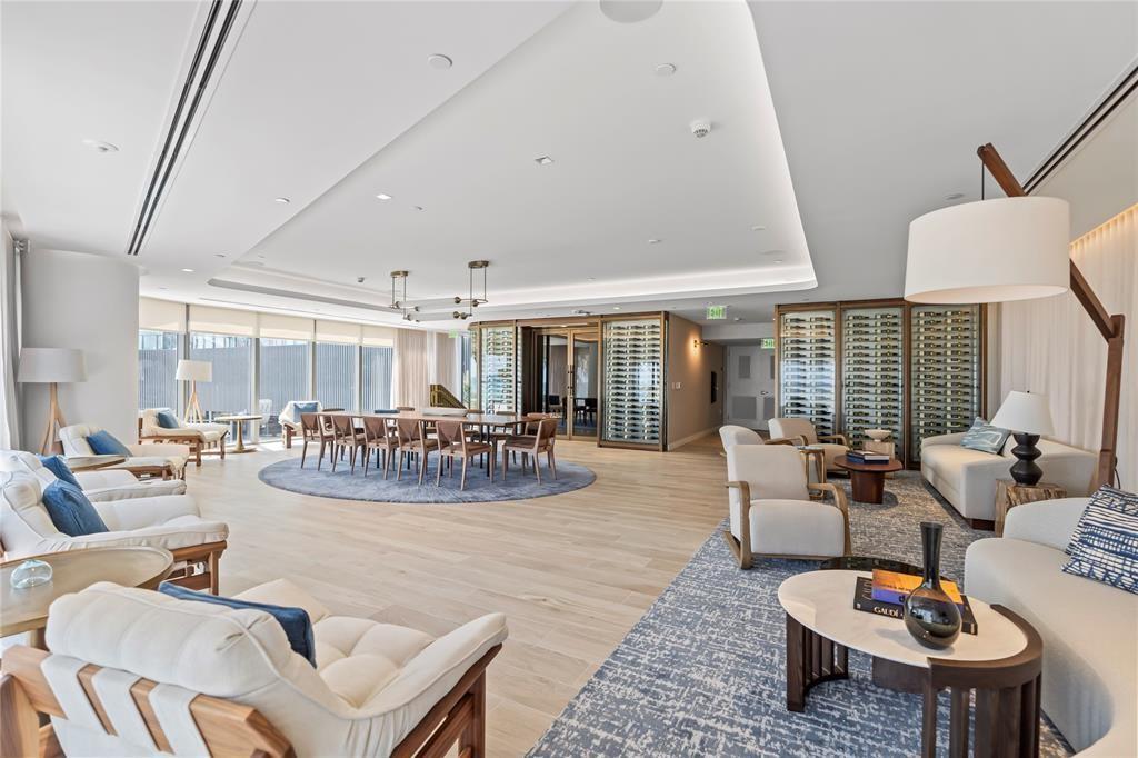 1116 North Ocean Boulevard, Unit 1606 Pompano Beach, FL 33062 - Photo 55 of 83 a living room with furniture and wooden floor
