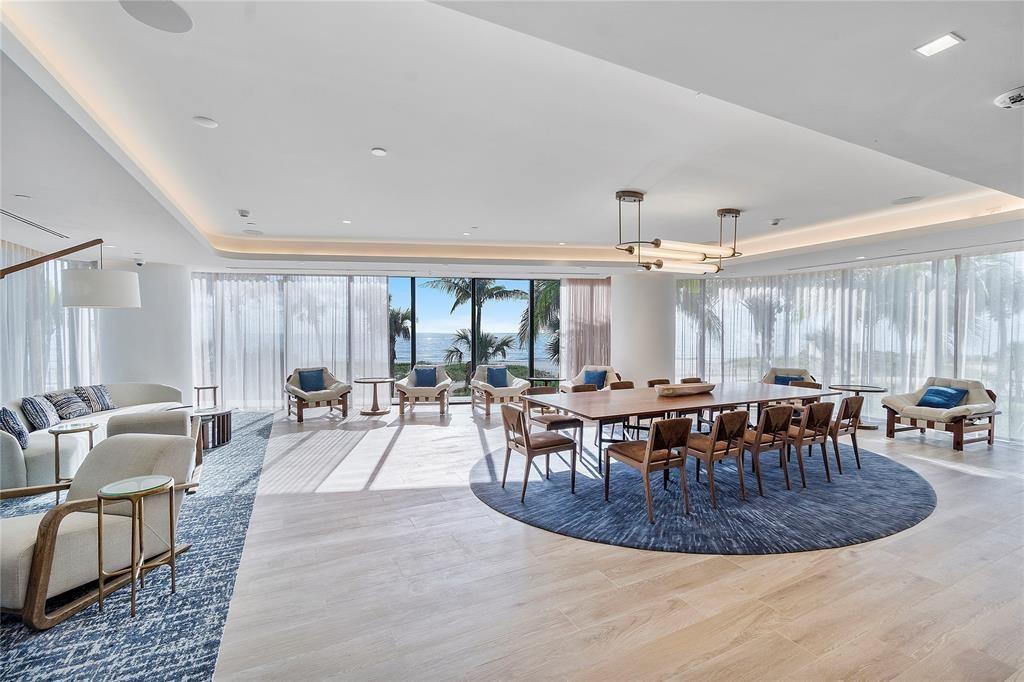 1116 North Ocean Boulevard, Unit 1606 Pompano Beach, FL 33062 - Photo 56 of 83 a view of a dining room with furniture a rug and wooden floor