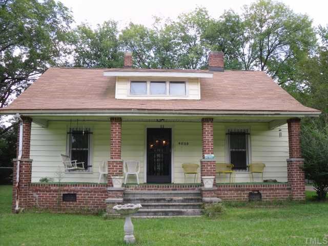 1030 Cross Link Road Raleigh, NC 27610 - Photo 1 of 4 a view of a house with garden and front view of a house