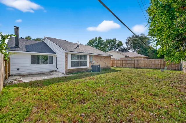 a house view with a garden space