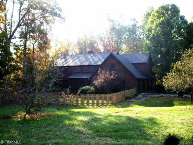 4811 New Sharon Church Road Hillsborough, NC 27278 - Photo 1 of 9 Exterior Front. This phot shows the fenced front yard.