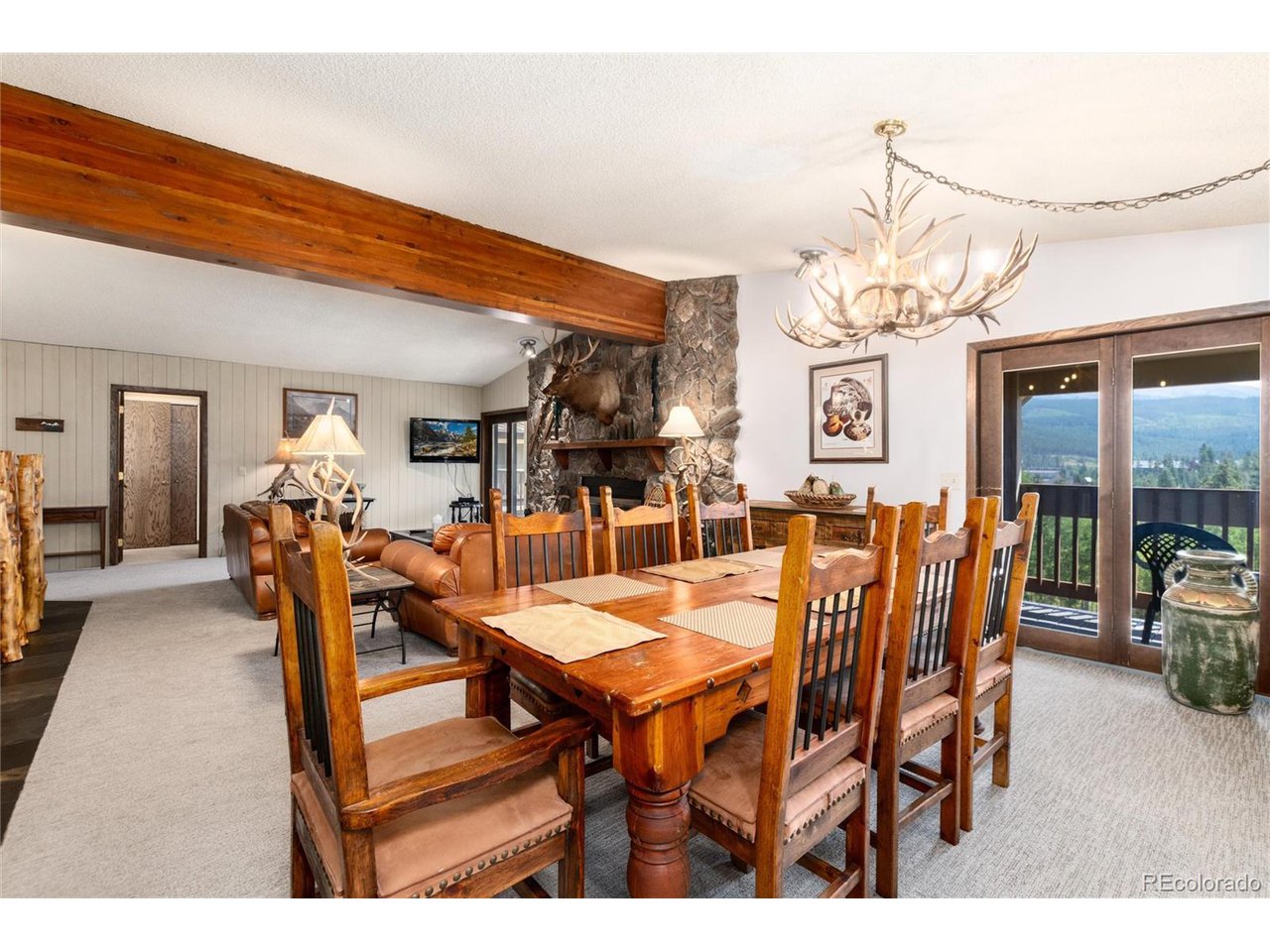 490 Kings Crossing Road, Unit 631 Winter Park, CO 80482 - Photo 11 of 43 a dining room with furniture and window