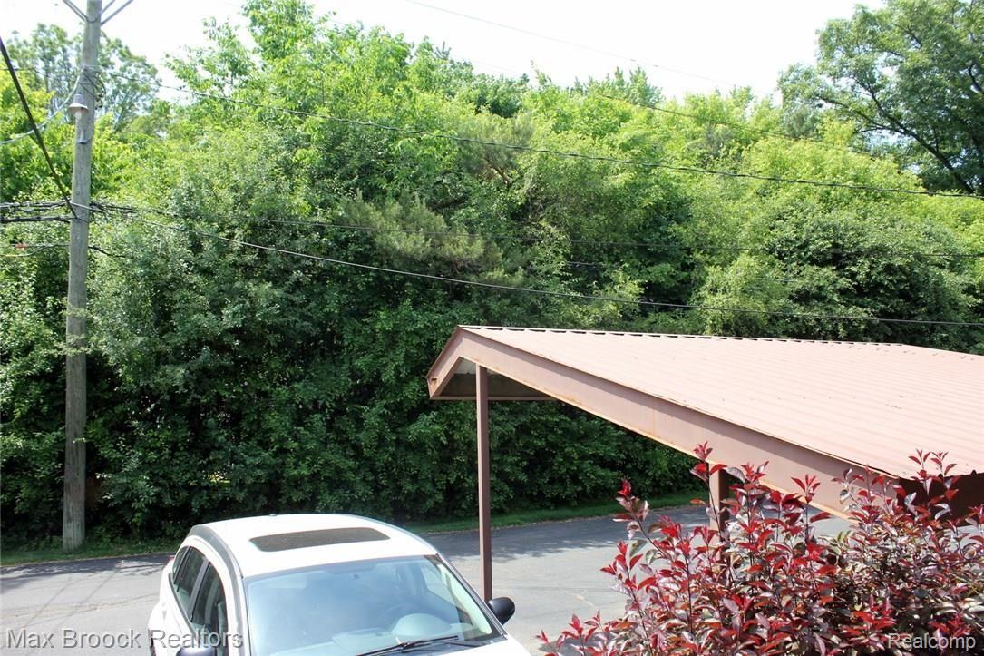 1051 North Adams Road, Unit 22 Birmingham, MI 48009 - Photo 27 of 30 Looking out from deck-very private!