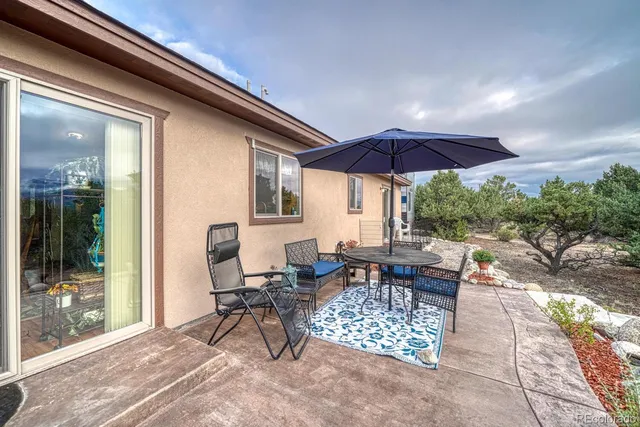a outdoor space with lots of tables and chairs