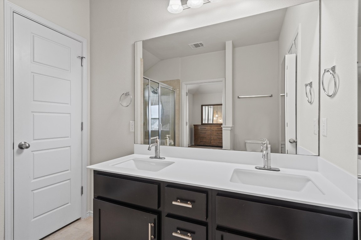 729 Coltrane Drive Pflugerville, TX 78660 - Photo 12 of 20 Primary bathroom