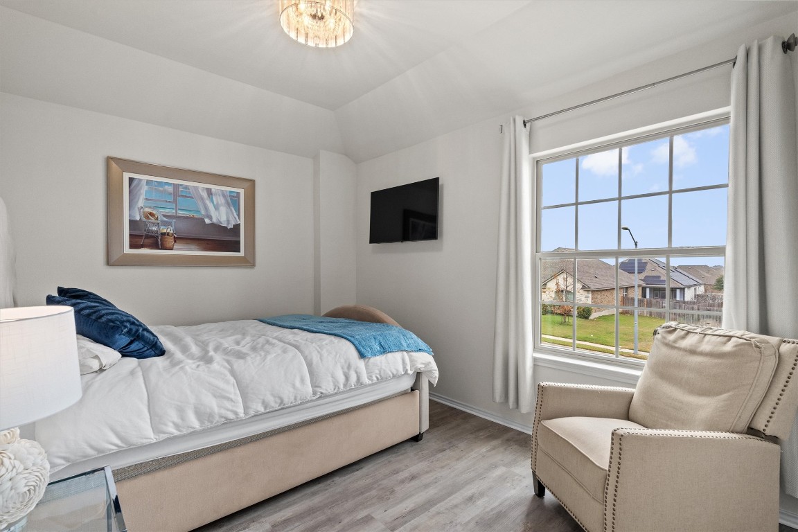 729 Coltrane Drive Pflugerville, TX 78660 - Photo 14 of 20 Secondary bedroom 1