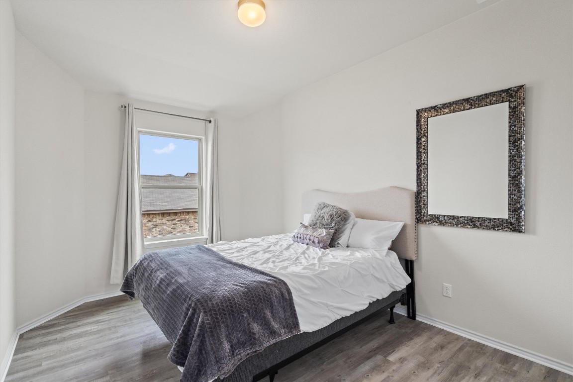 729 Coltrane Drive Pflugerville, TX 78660 - Photo 15 of 20 Secondary bedroom 2