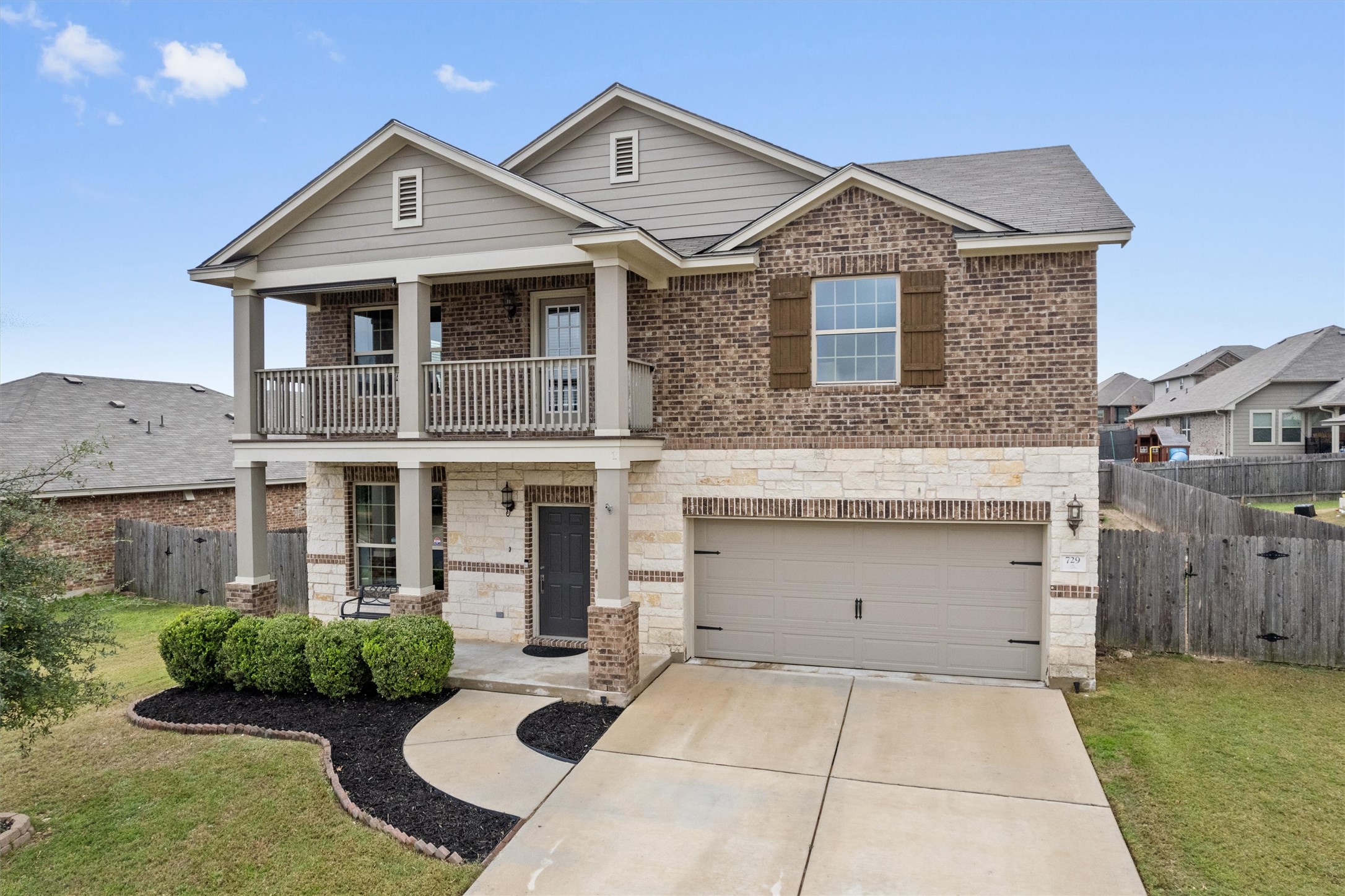 729 Coltrane Drive Pflugerville, TX 78660 - Photo 2 of 20 Beautifully landscaped, second level balcony