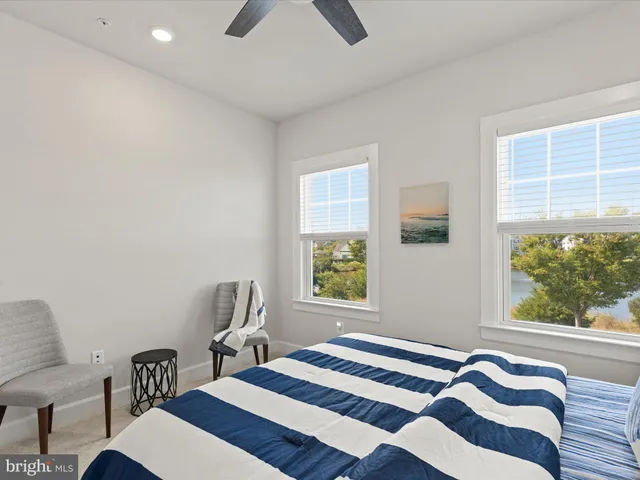 a outdoor living space with furniture and a potted plant