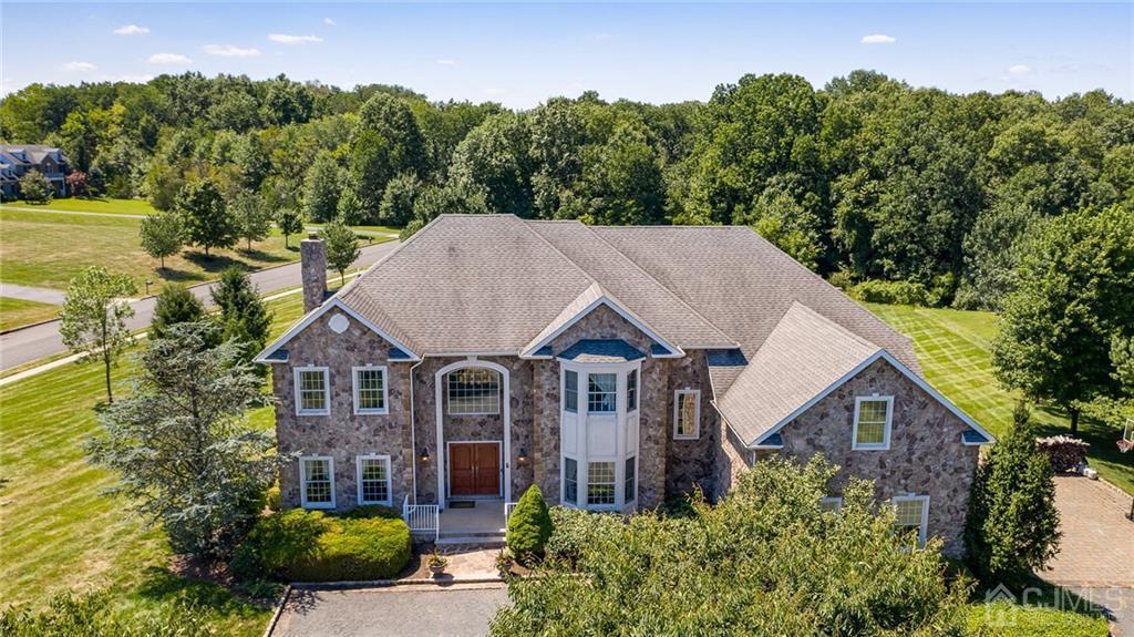 5 Daisy Court Skillman, NJ 08558 - Photo 1 of 50 a aerial view of a house next to a yard