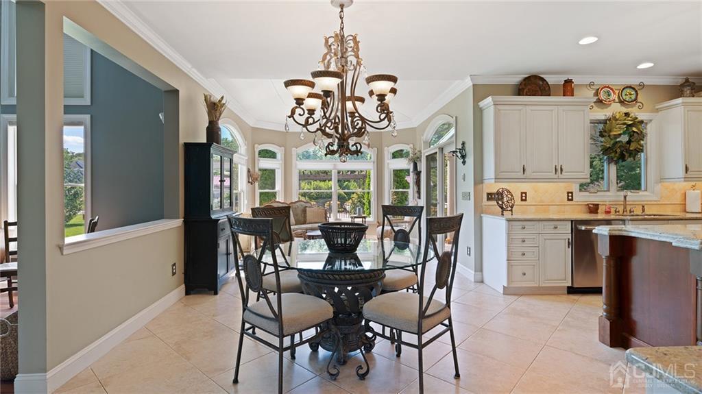 5 Daisy Court Skillman, NJ 08558 - Photo 19 of 50 a view of a dining room with furniture and chandelier