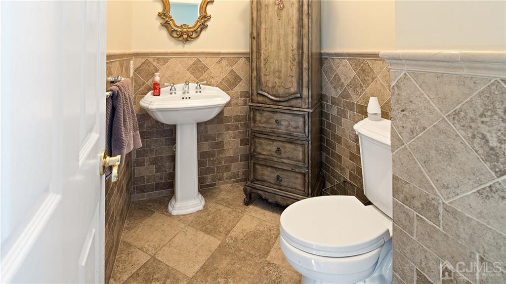 5 Daisy Court Skillman, NJ 08558 - Photo 27 of 50 a bathroom with a toilet and a sink