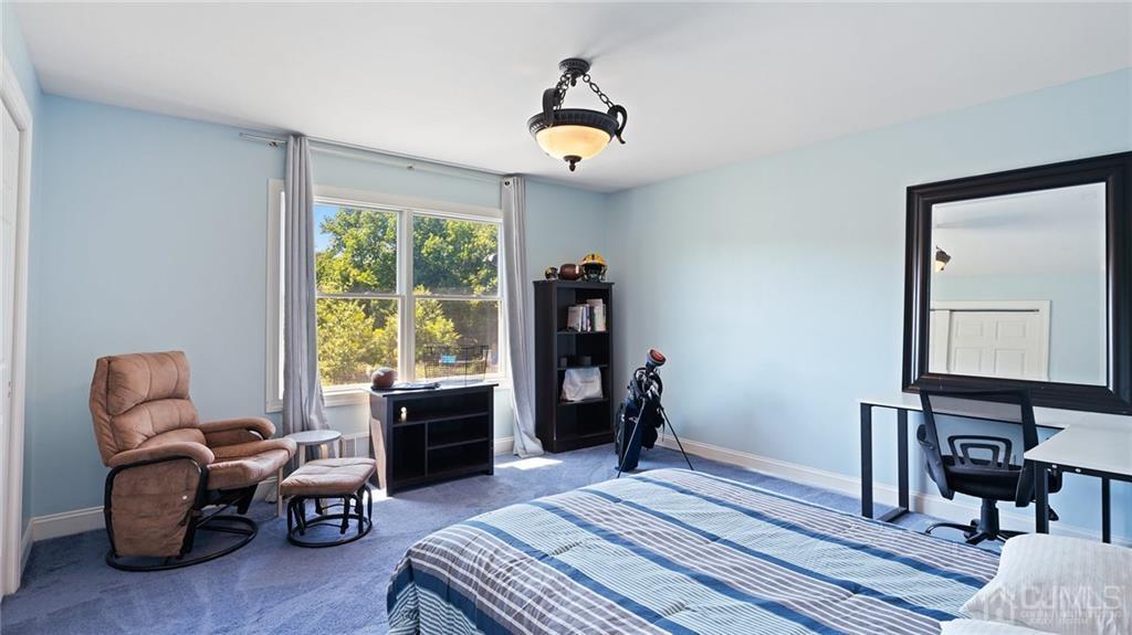 5 Daisy Court Skillman, NJ 08558 - Photo 34 of 50 a bedroom with furniture and a window