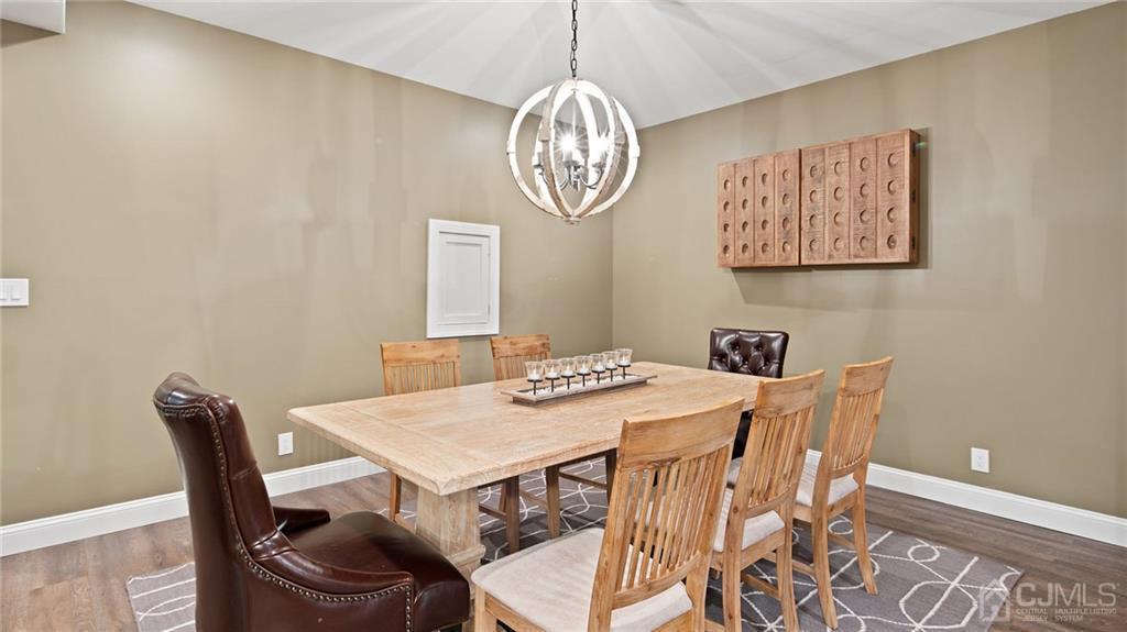 5 Daisy Court Skillman, NJ 08558 - Photo 45 of 50 a view of a dining area with furniture and wooden floor