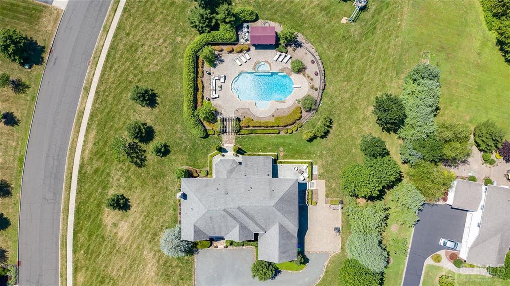5 Daisy Court Skillman, NJ 08558 - Photo 5 of 50 an aerial view of a house with a swimming pool