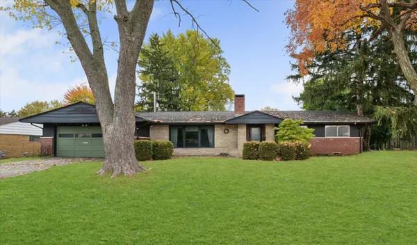 a view of a yard in front of a house