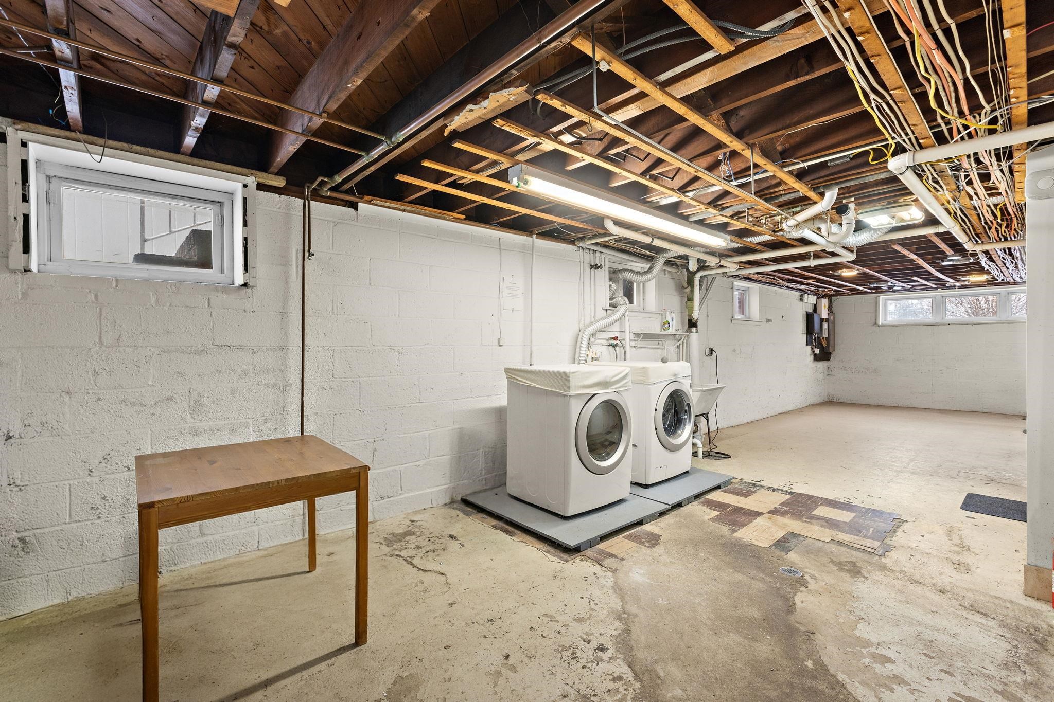 97 Riverview Avenue Cliffside Park, NJ 07010 - Photo 18 of 26 a utility room with dryer and washer