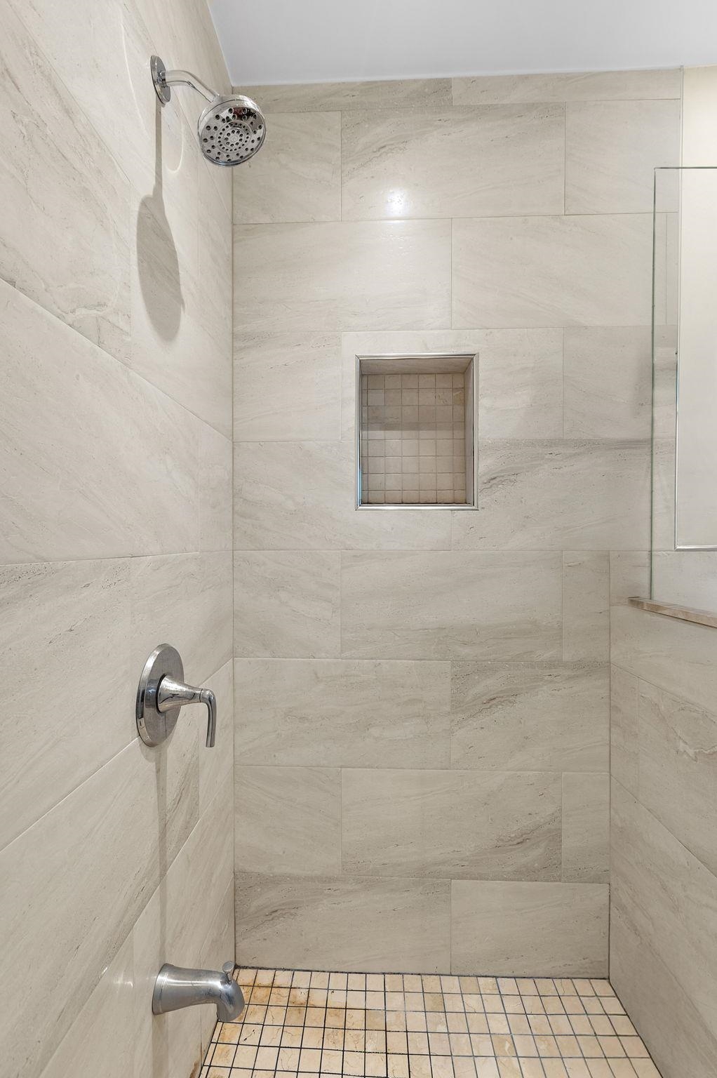 97 Riverview Avenue Cliffside Park, NJ 07010 - Photo 8 of 26 a bathroom with a shower