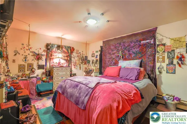 a bed room with a bed and a couch