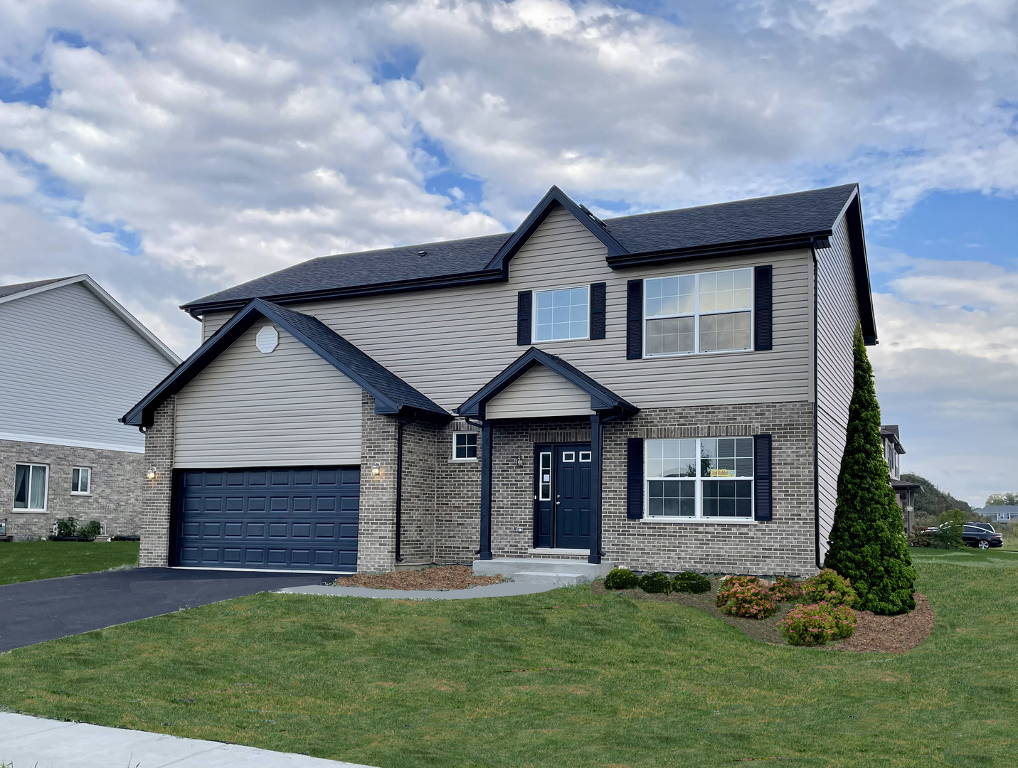 901 Willow Road Manteno, IL 60950 - Photo 1 of 17 a front view of a house with a yard
