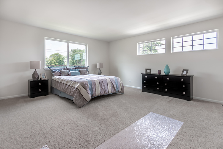 901 Willow Road Manteno, IL 60950 - Photo 17 of 17 a bed room with a bed and a large window