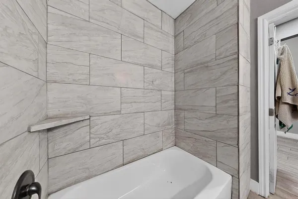 a bathroom with a bathtub