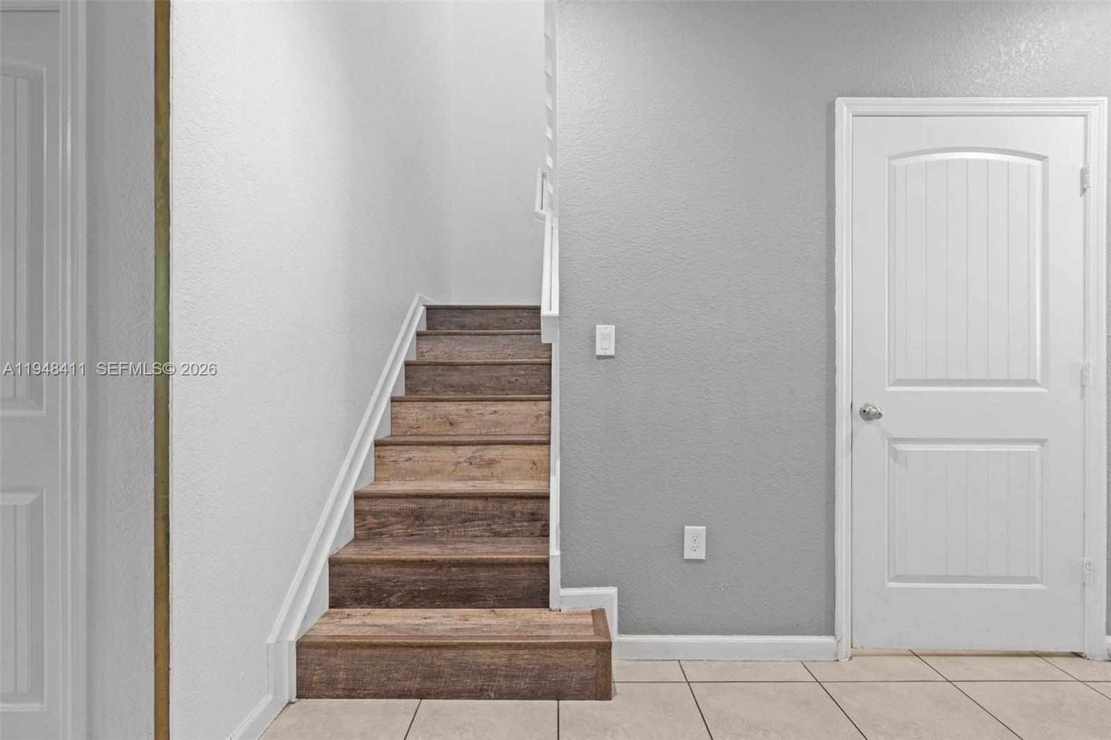 550 Northeast 33rd Terrace Homestead, FL 33033 - Photo 15 of 31 a view of staircase with white walls
