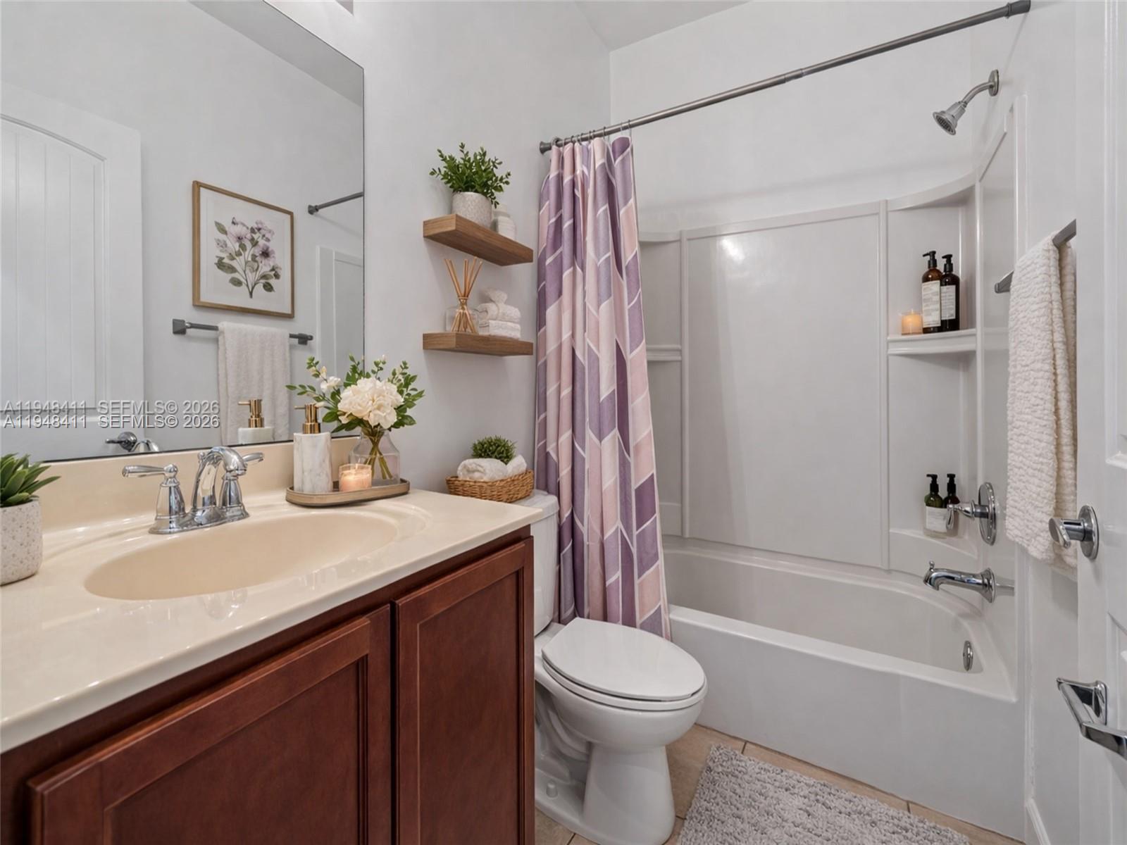 550 Northeast 33rd Terrace Homestead, FL 33033 - Photo 27 of 31 a bathroom with a sink a toilet and shower
