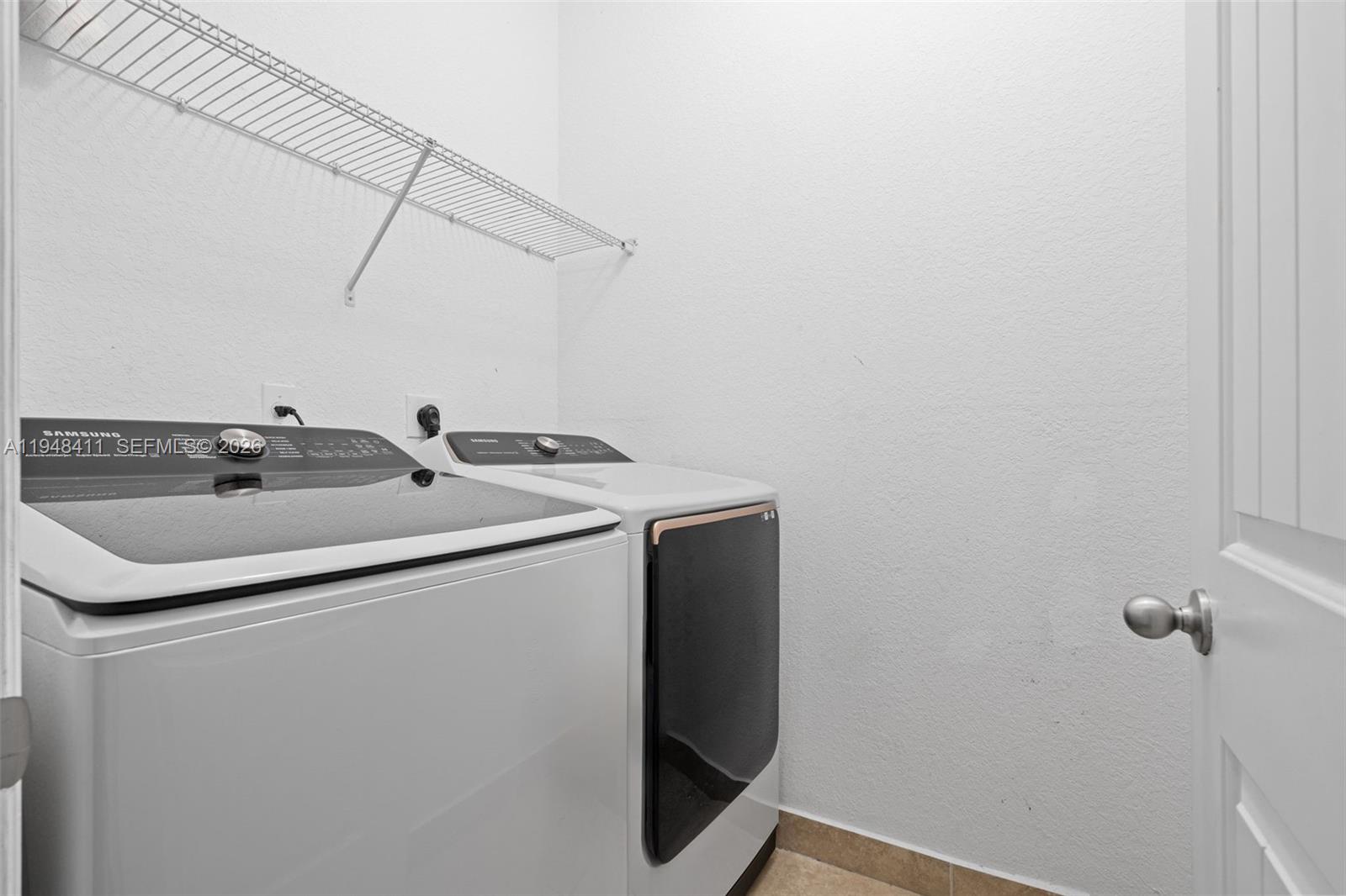 550 Northeast 33rd Terrace Homestead, FL 33033 - Photo 29 of 31 a utility room with dryer and washer