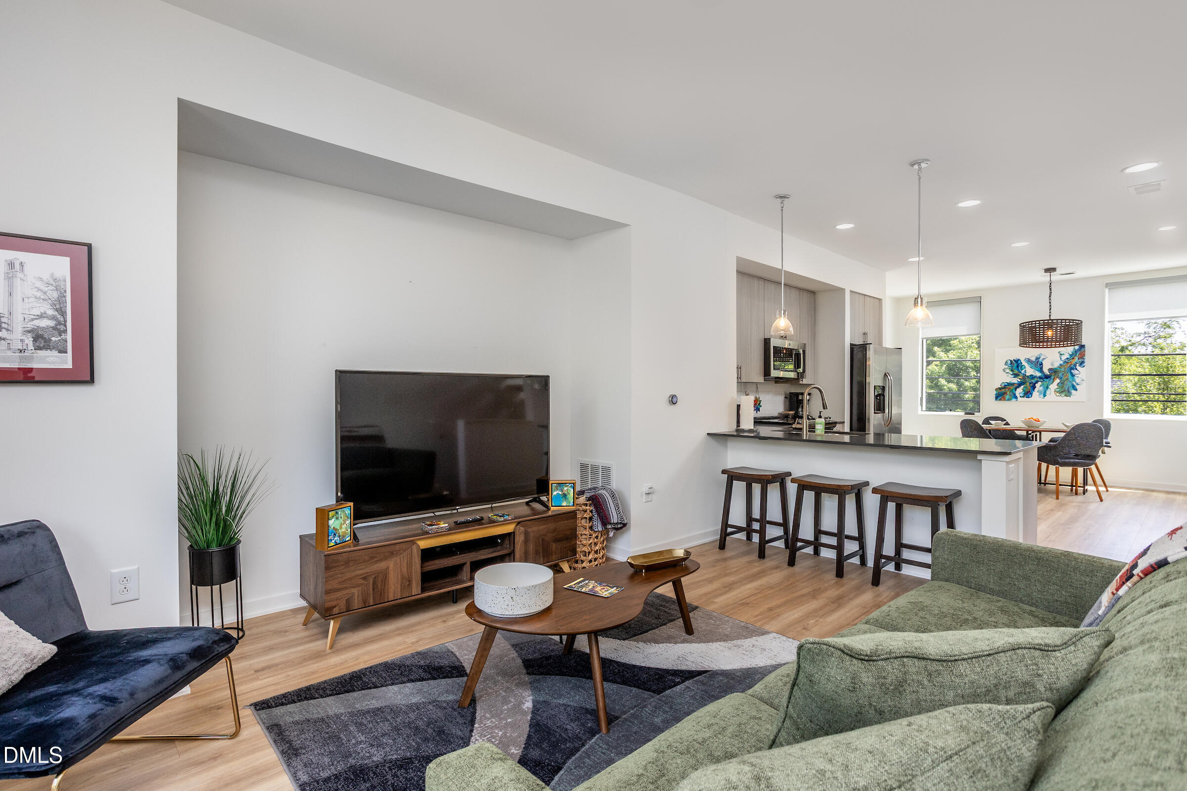 536 South Person Street Raleigh, NC 27601 - Photo 2 of 31 a living room with furniture and a flat screen tv