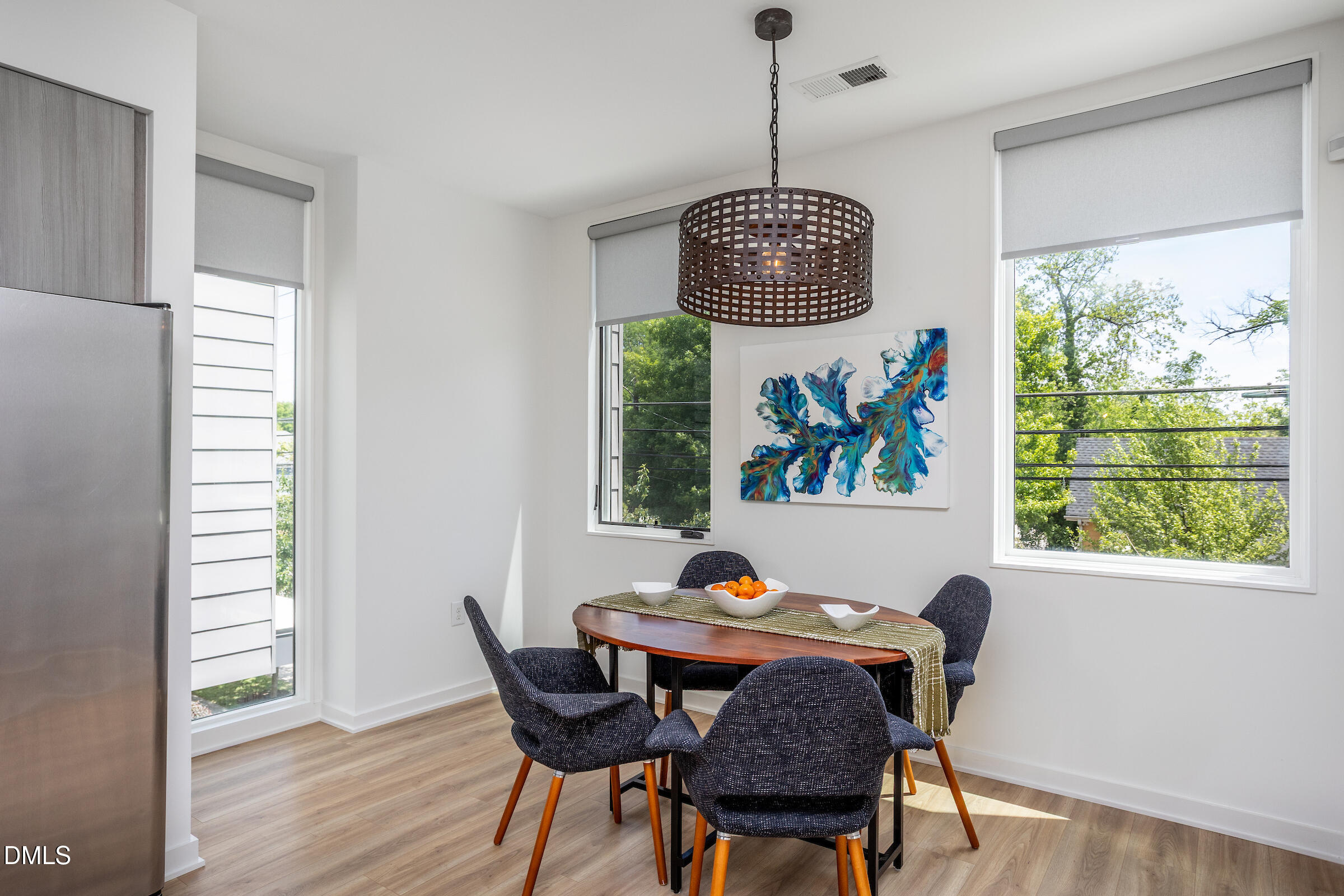 536 South Person Street Raleigh, NC 27601 - Photo 21 of 31 a view of a dining room with furniture window and wooden floor