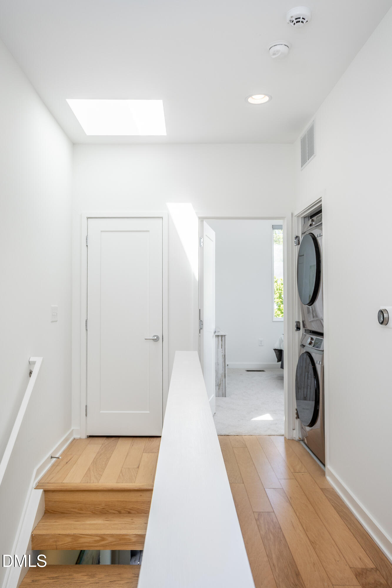 536 South Person Street Raleigh, NC 27601 - Photo 27 of 31 a bedroom with a bed and a mirror