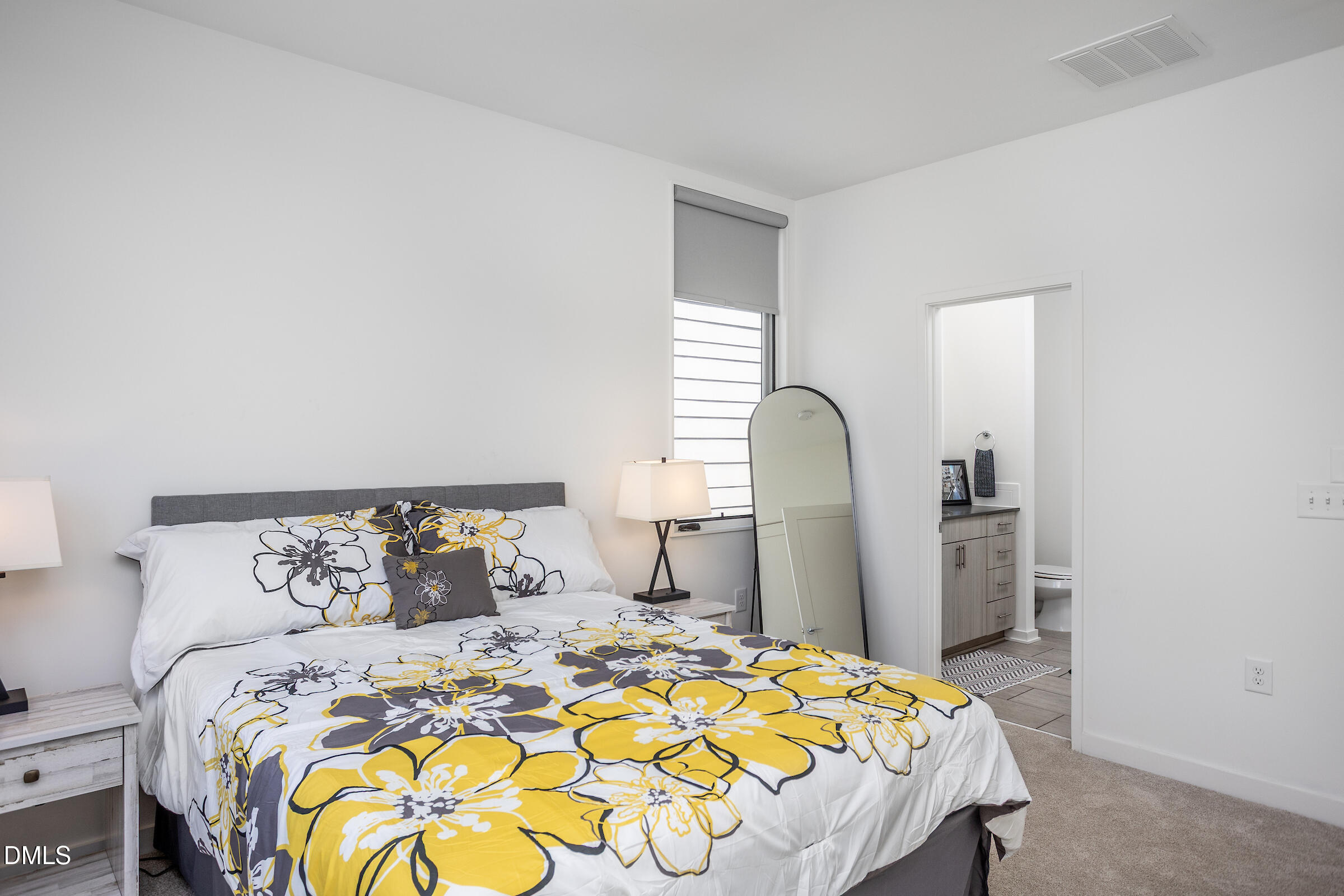 536 South Person Street Raleigh, NC 27601 - Photo 7 of 31 a bedroom with a bed and a dresser