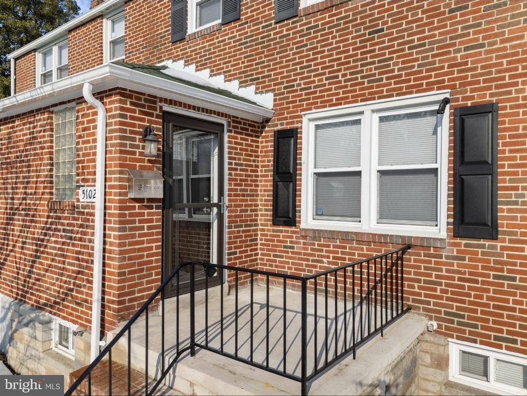 5102 Plymouth Road Baltimore, MD 21214 - Photo 1 of 32 a front view of a house