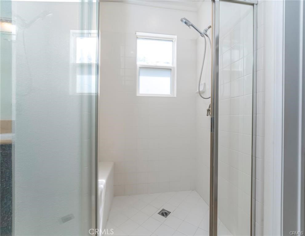 540 Boxcar Lane Brea, CA 92823 - Photo 19 of 36 a bathroom with a glass shower door