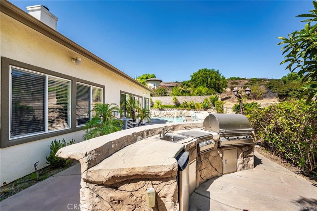 540 Boxcar Lane Brea, CA 92823 - Photo 26 of 36 a balcony with table and chairs
