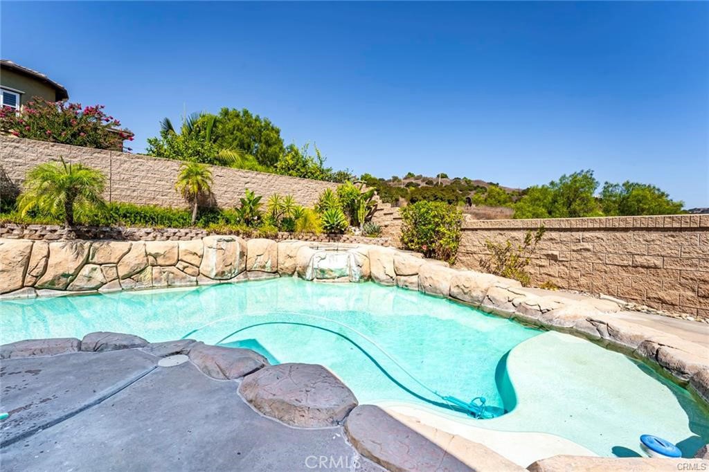 540 Boxcar Lane Brea, CA 92823 - Photo 28 of 36 a view of a swimming pool with a lake view