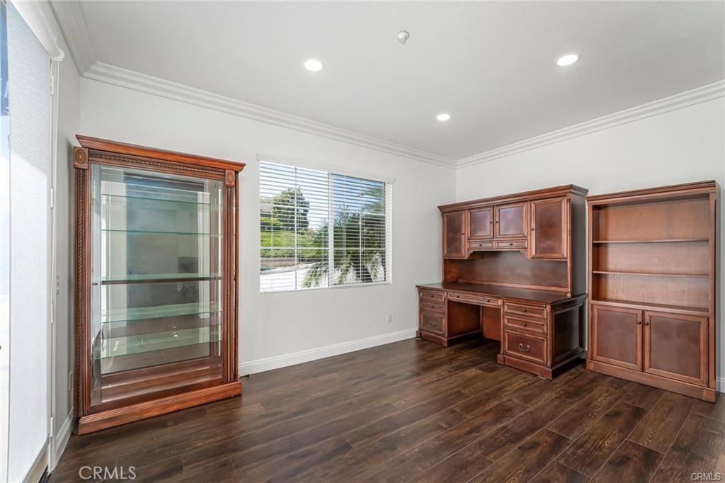 540 Boxcar Lane Brea, CA 92823 - Photo 6 of 36 a room with wooden floor and windows