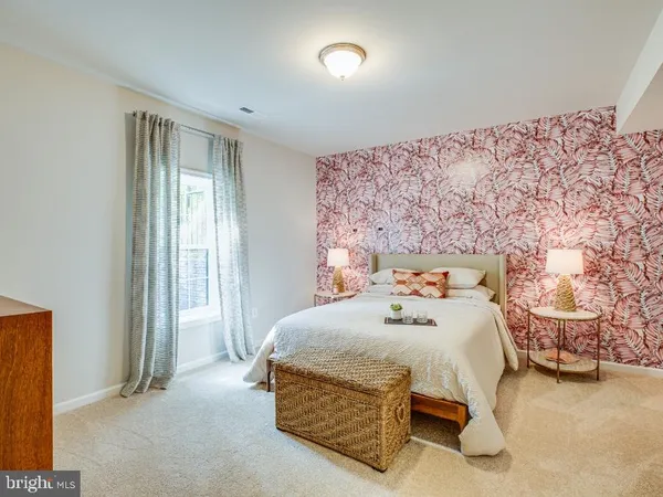 a bedroom with a bed and a cabinets