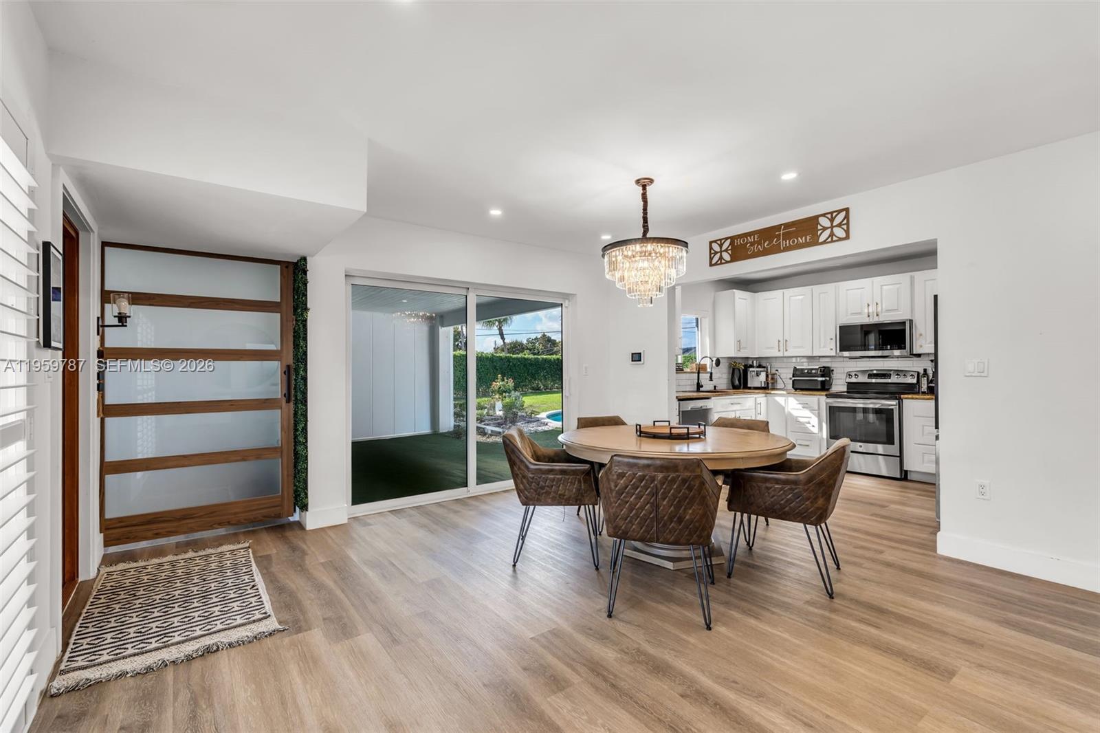10971 Southwest 177th Street Miami, FL 33157 - Photo 11 of 41 a view of a dining room with furniture