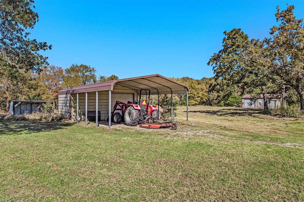 9510 South State Highway Scurry, TX 75158 - Photo 21 of 26 a view of a house with a yard