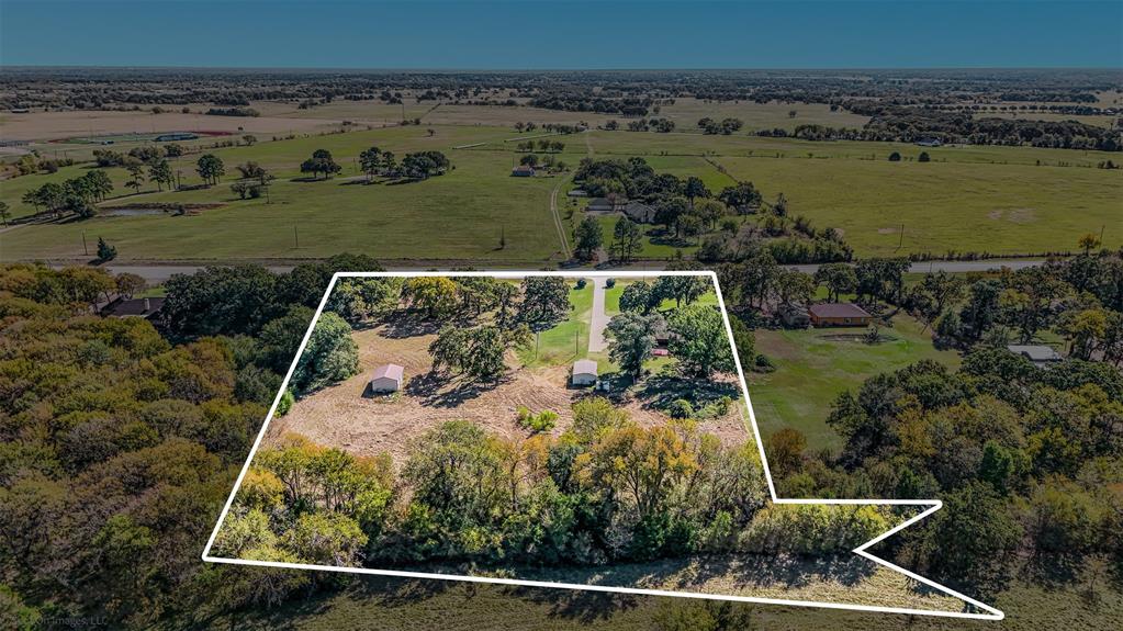 9510 South State Highway Scurry, TX 75158 - Photo 26 of 26 an aerial view of a residential houses with outdoor space