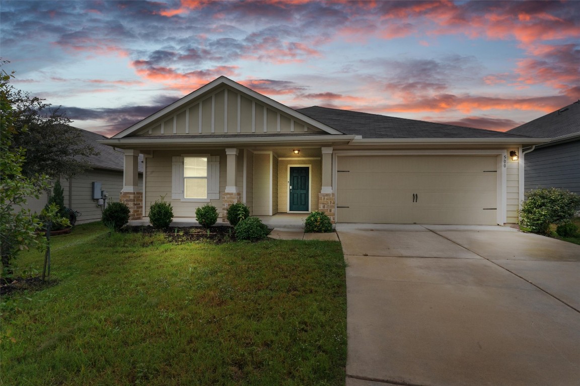 500 Cassandra Drive Hutto, TX 78634 - Photo 1 of 1 a front view of house with yard and green space