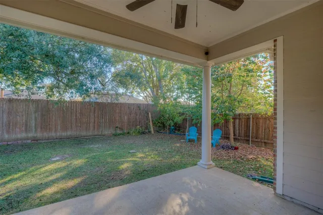 a view of a backyard with garden