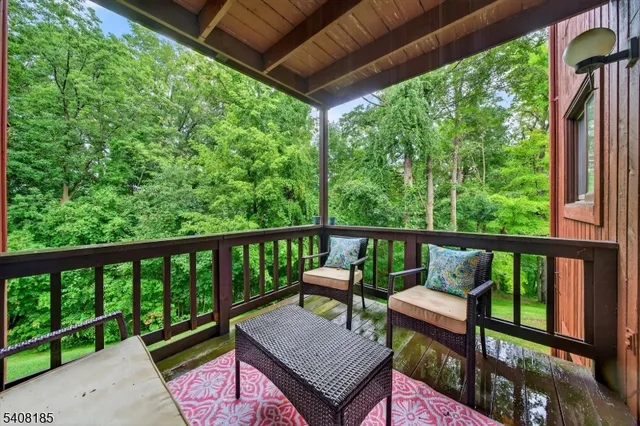 a view of a two chairs in the deck