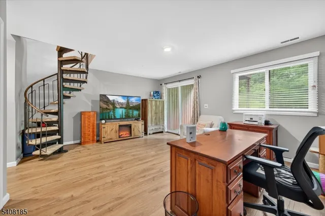 a workspace with furniture and window