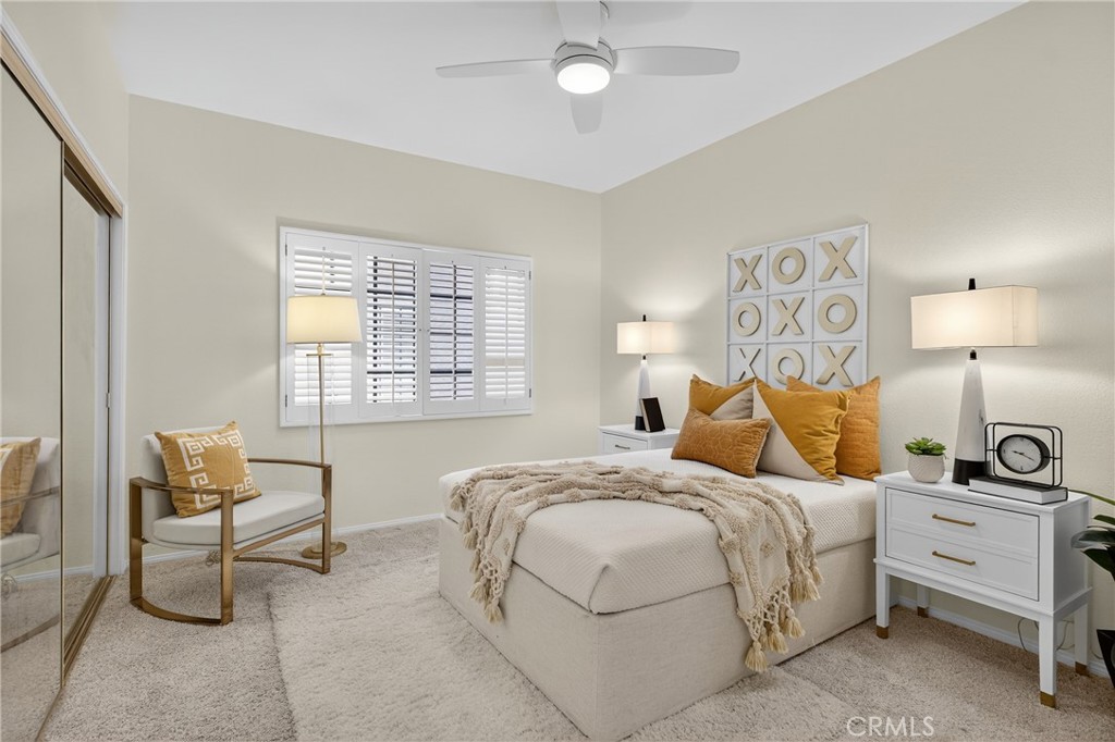 618 Fairview Avenue, Unit 107 Arcadia, CA 91007 - Photo 12 of 18 a bedroom with a bed and a lamp on dresser