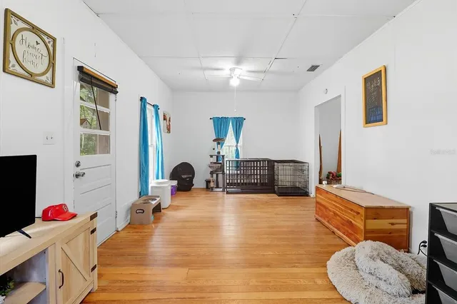 a room with furniture and a flat screen tv