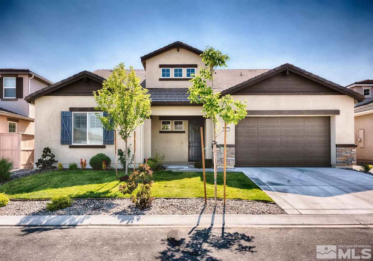 10230 Mott Drive Reno, NV 89521 - Photo 1 of 1 a view of house with garden and swimming pool