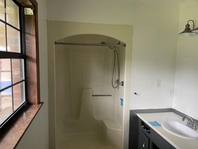 6047 Eden Square Crestview, FL 32539 - Photo 15 of 39 a bathroom with a sink and a shower